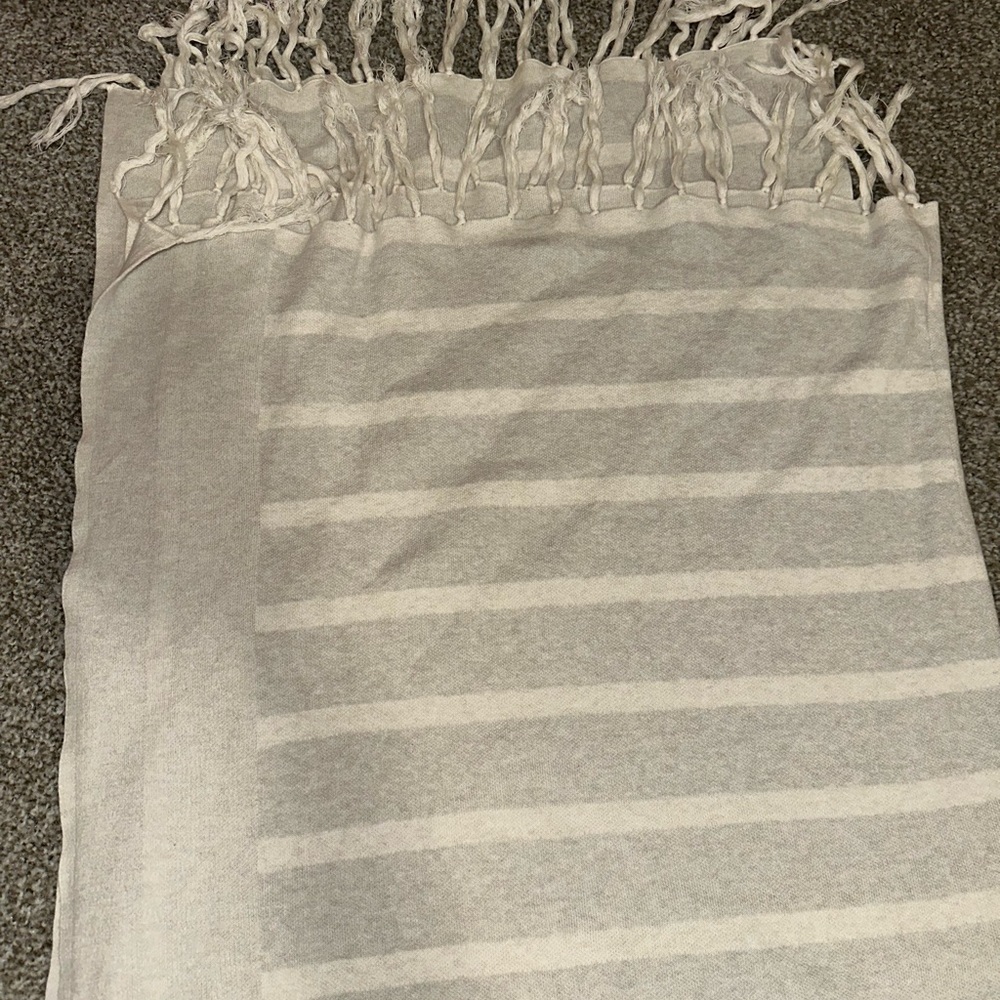 CAbi fringe wrap tassel sweater.